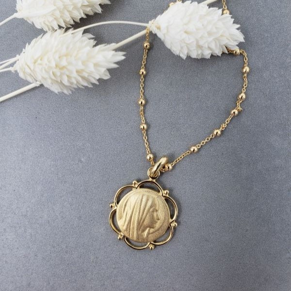 Collier religieux avec une médaille de la Vierge Marie fleurie