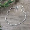 Bracelet dizainier plaqué or ou argent – croix et 10 grains de prière